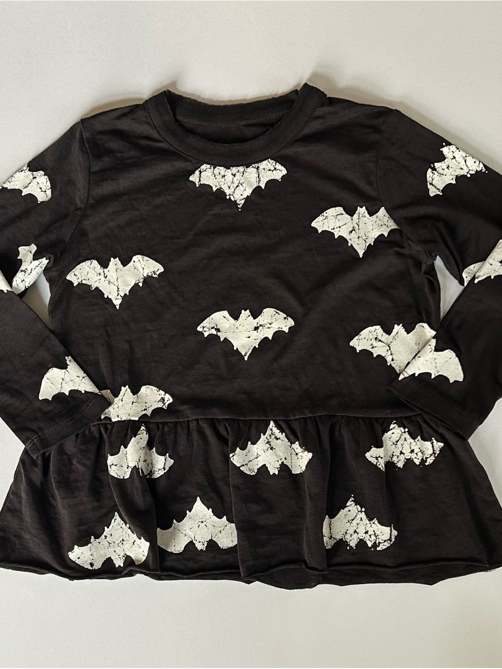 Chaser Black Long-Sleeve Peplum Top with White Bat Print - Kids